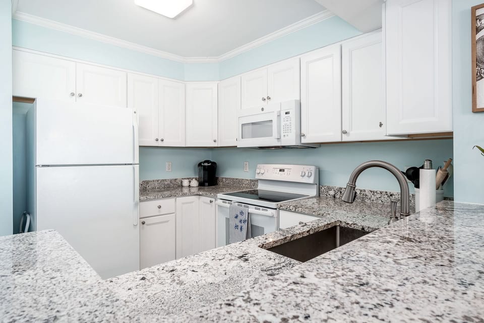 Updated kitchen with 2019 appliances; 2021 Built-in Microwave.