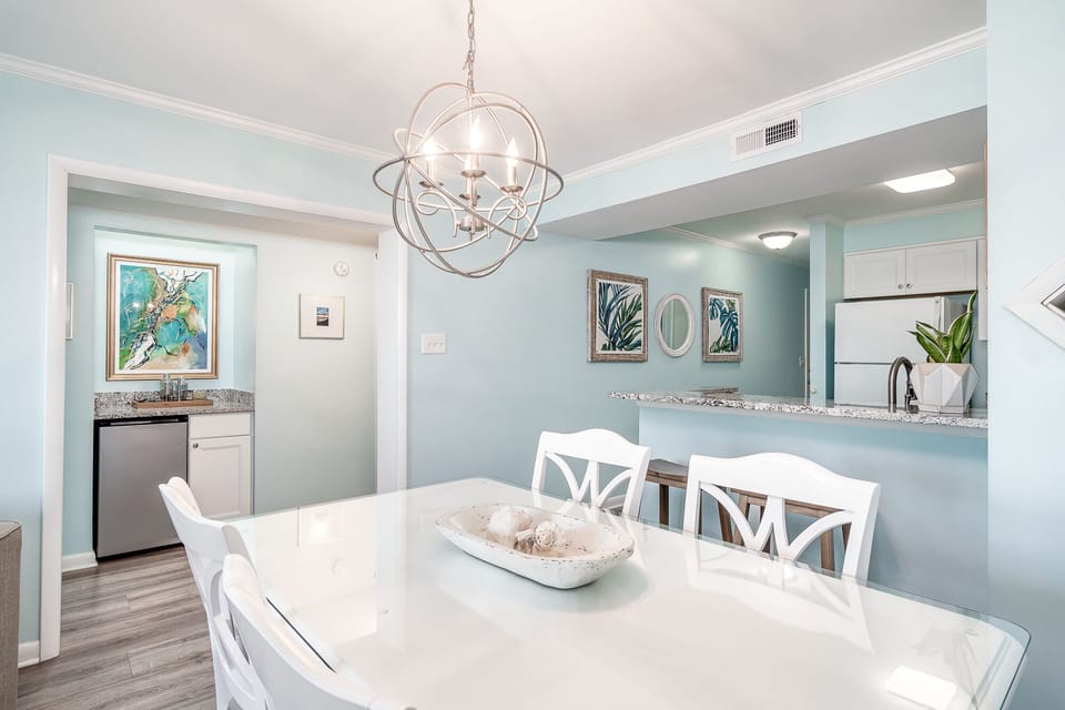 Wet bar with small refrigerator.