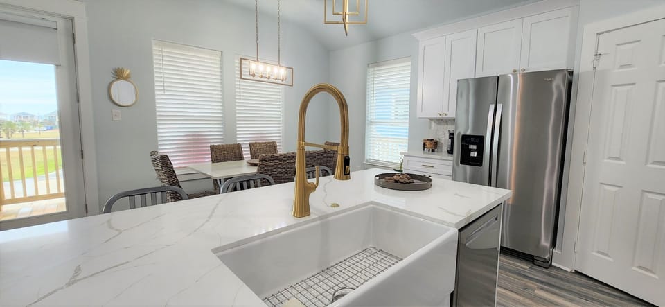 Large sink with moveable faucet.