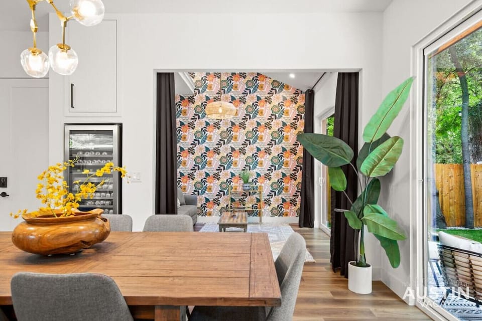 Dining area with drink fridge and second living area facing the yard