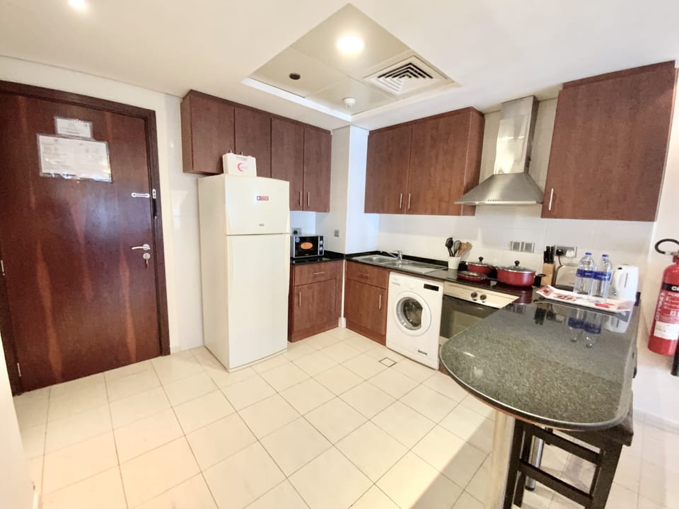 Apartment | Private kitchen | Full-size fridge, microwave, oven, stovetop