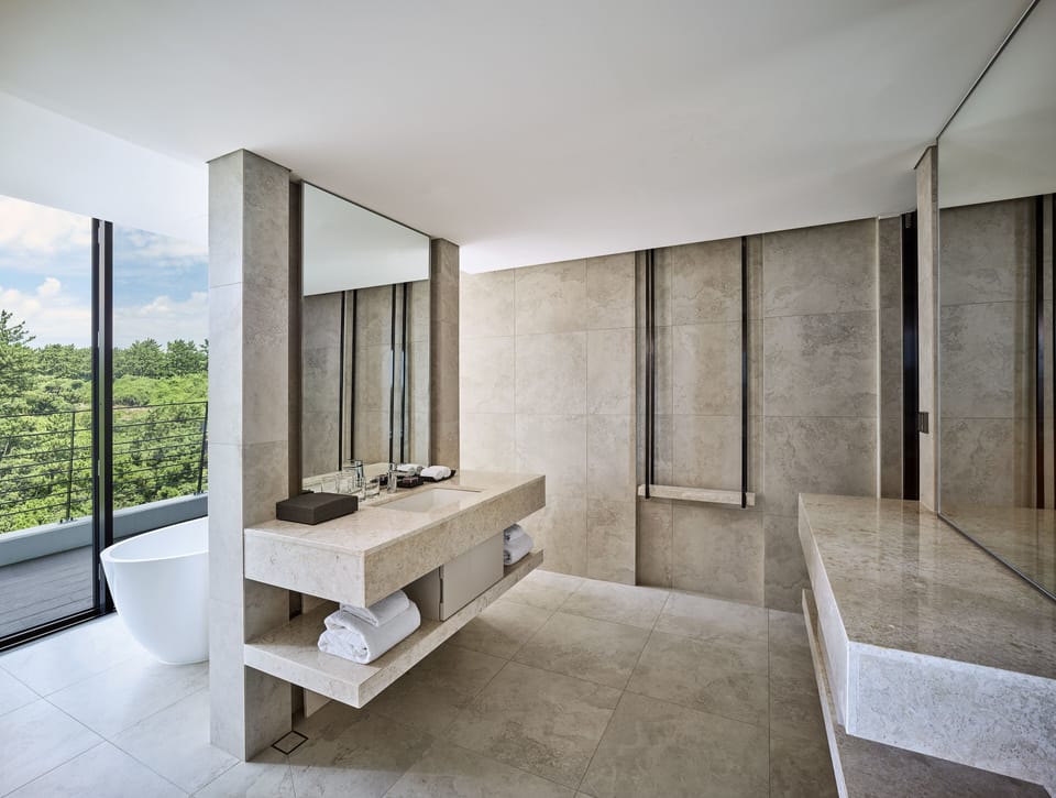 Club Presidential Suite Ocean View (Club access for 4) | Bathroom | Hair dryer, bathrobes, slippers, bidet