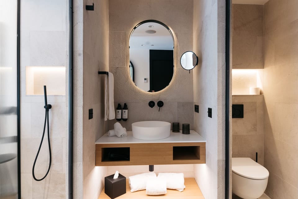 Shower, eco-friendly toiletries, hair dryer, bathrobes