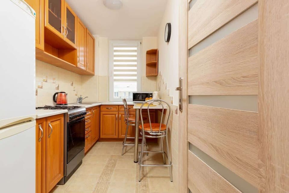 Fully equipped kitchen with kettle.