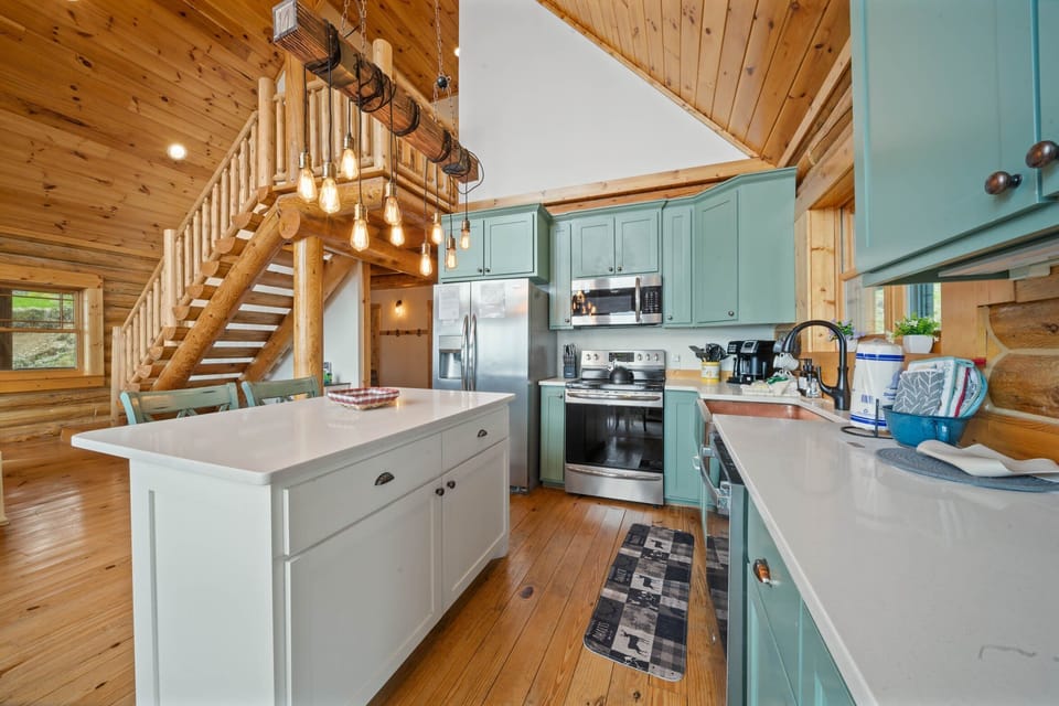 Spacious Kitchen with Granite Counters and Stainless Appliances