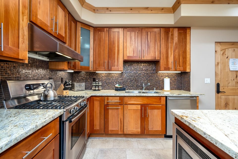 Condo, 2 Bedrooms | Private kitchen | Coffee/tea maker, fridge, oven, toaster