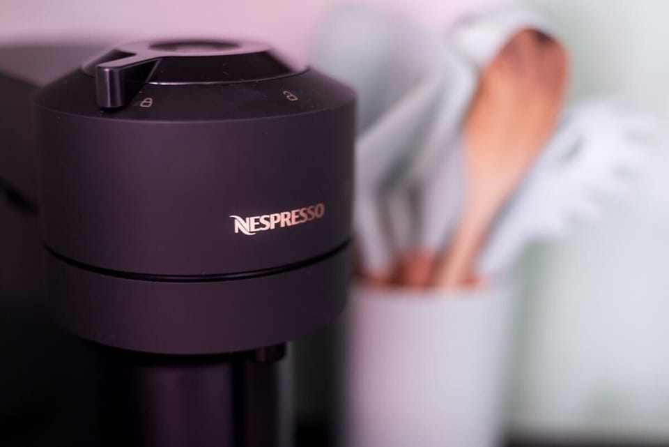 Nespresso Vertuo Next coffee machine with pods included.