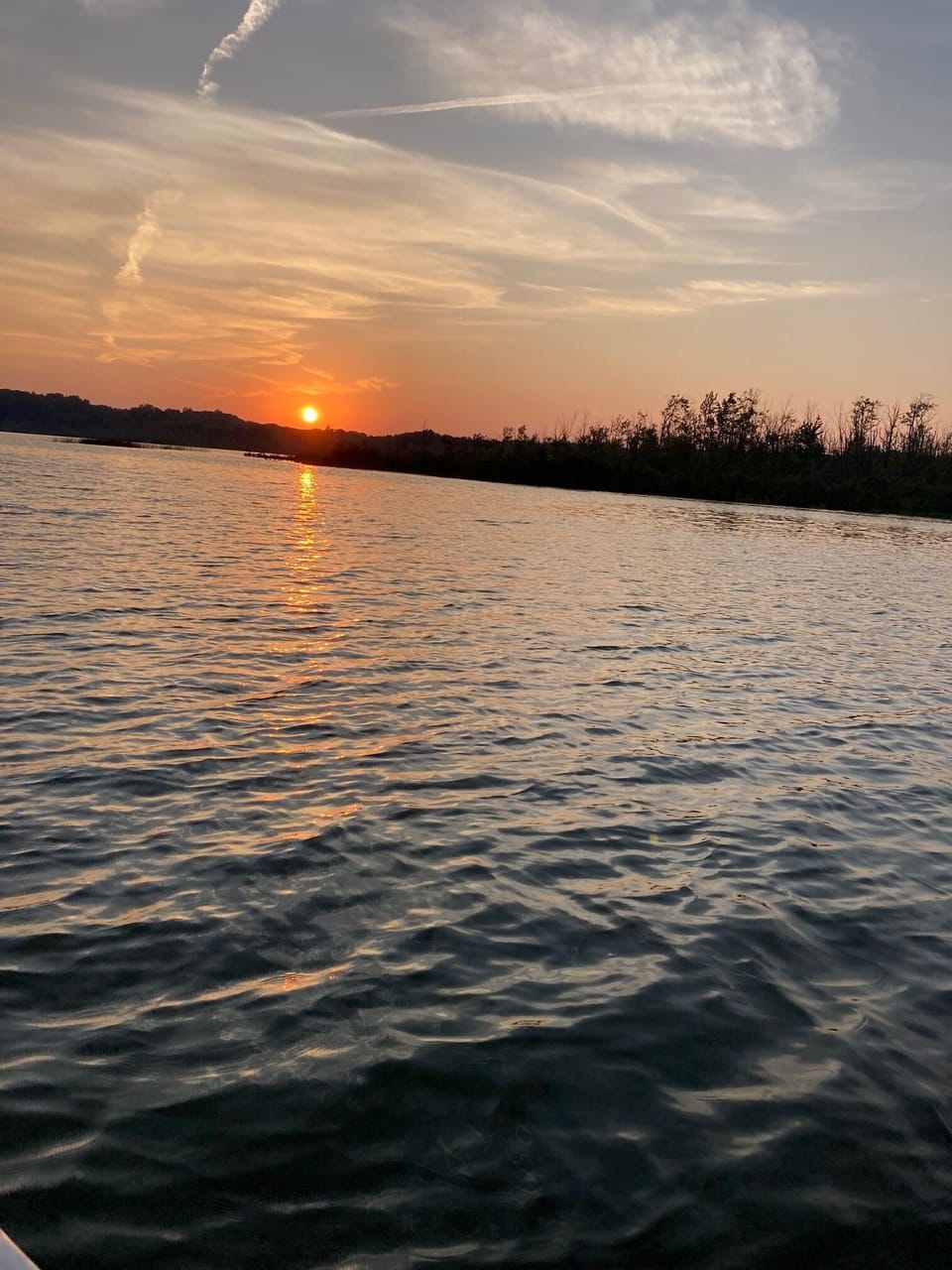 This beautiful picture was taken from out on the calm lake.