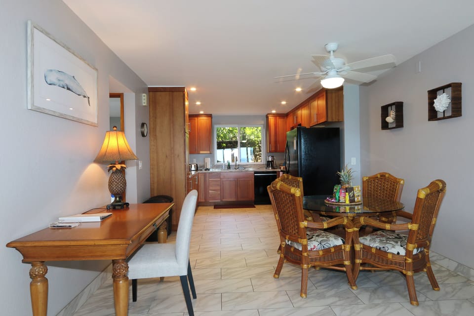 View of kitchen, desk, and kitchen.