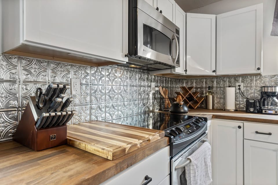 Designer Kitchen with butcher block countertops. 