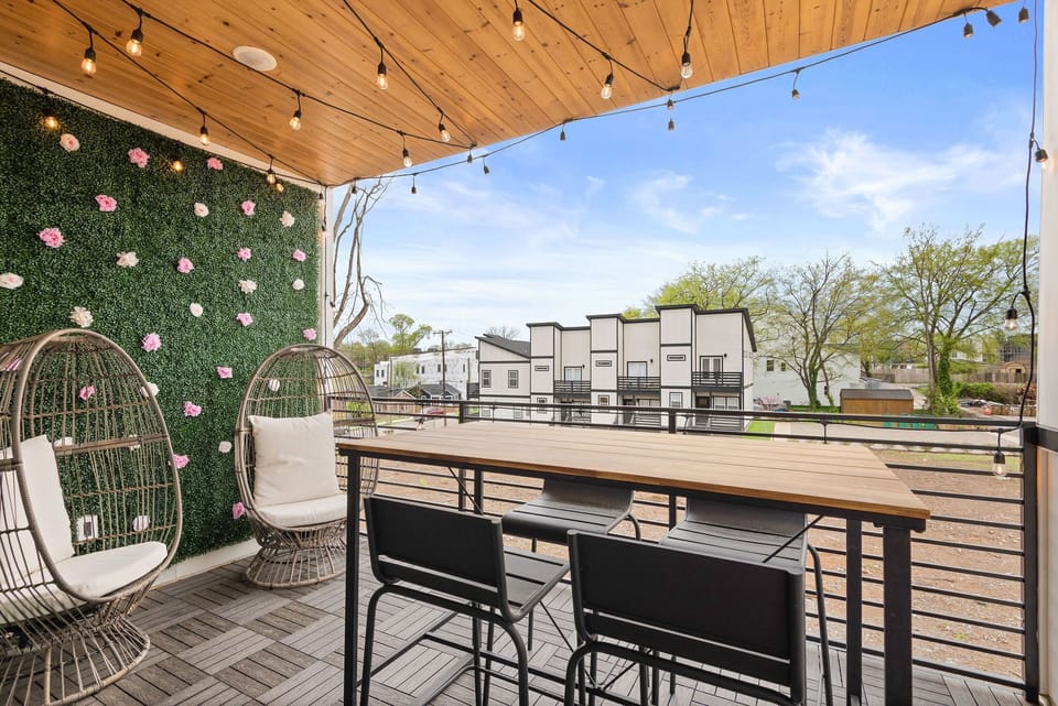 Large covered patio right off the living room, with full-length sliding doors.