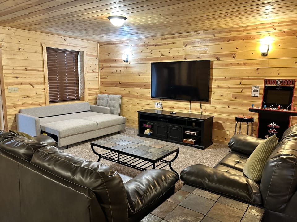 Basement: Couch converts to a Queen size bed.