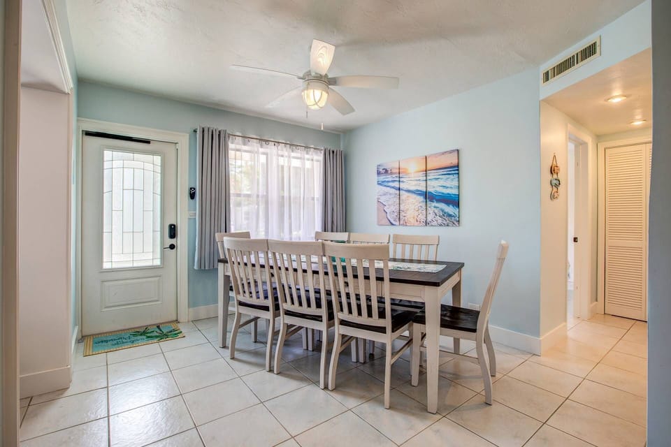 The dining room offers ample seating, perfect for hosting gatherings and entertaining with ease.