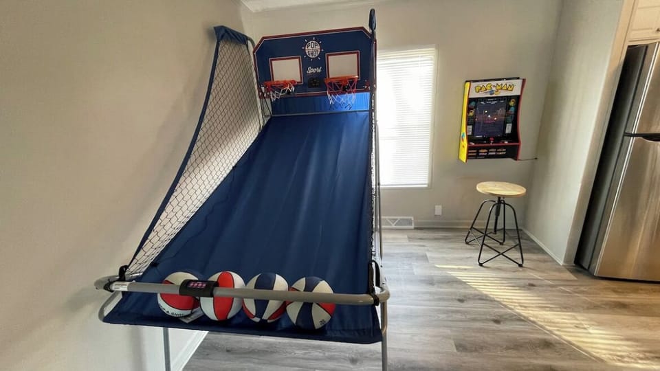 Challenge your friends to a game of Pop A Shot or Pac Man/GALAGA