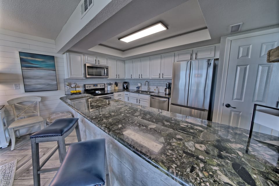 Seating at the bar allows for great entertaining while preparing meals 
