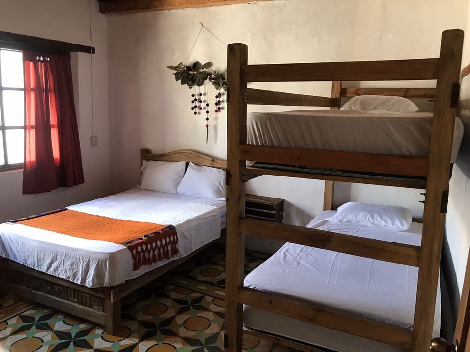 Economy Quadruple Room, 1 Bedroom | WiFi (free), bed sheets