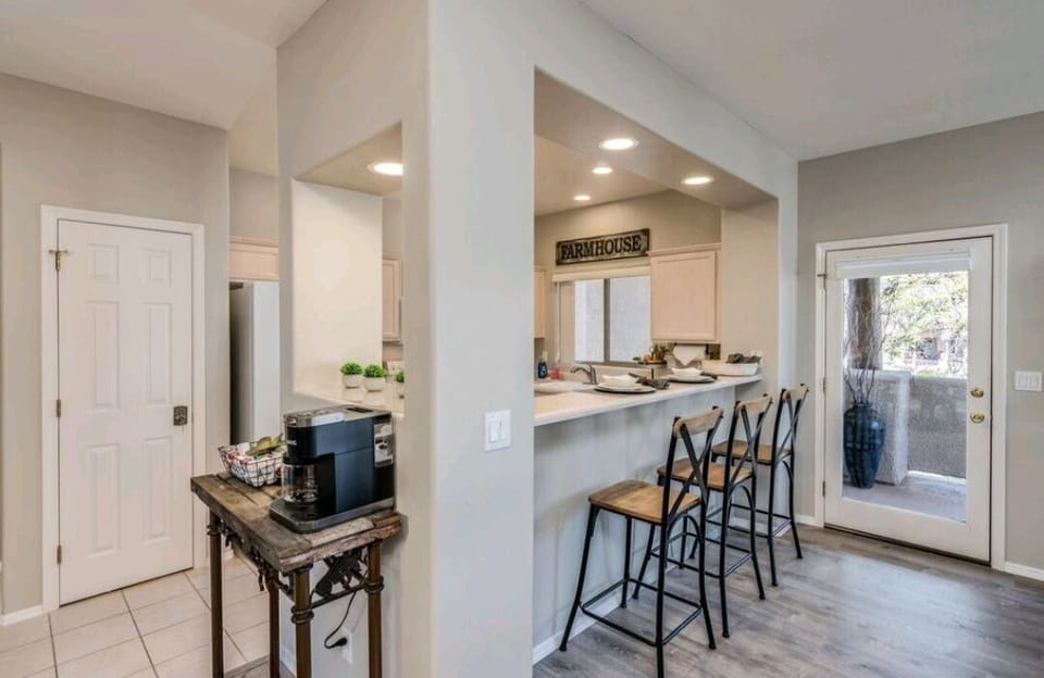 Coffee bar with additional seating for 3 at breakfast bar