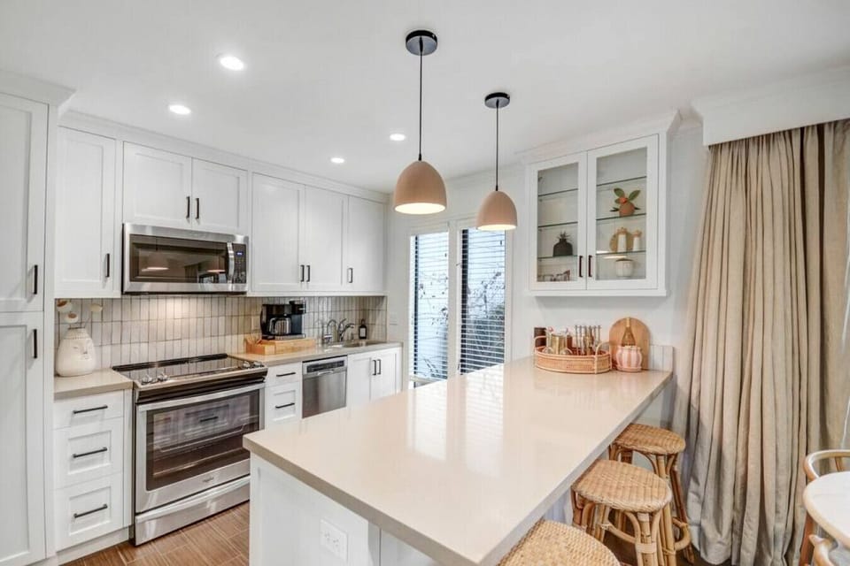 Plan your day over a cup of joe at the spacious kitchen island
