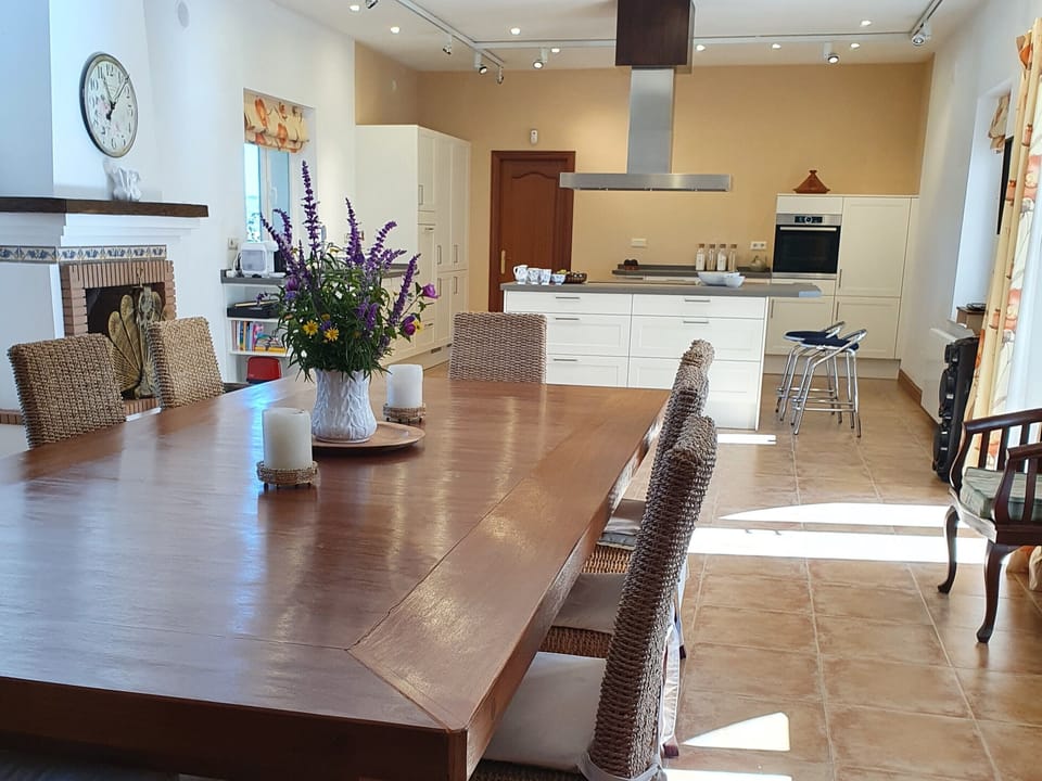 The dining room leads to the open kitchen.