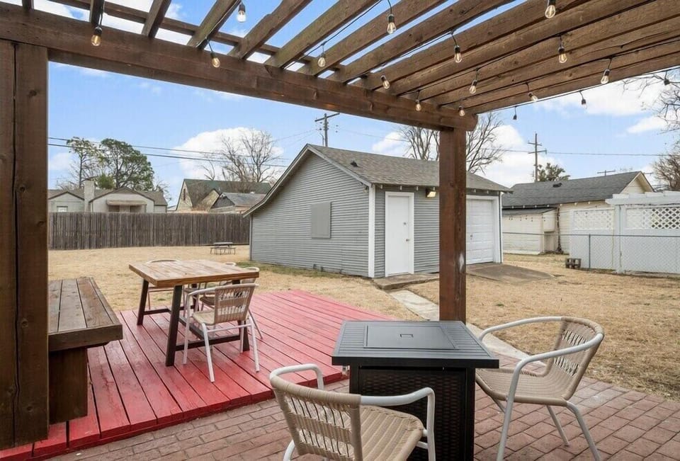 Back patio has a propane grill and firepit.  Dining table has seating for 6-8.  Guest do not have access to the garage, but there is driveway parking available.