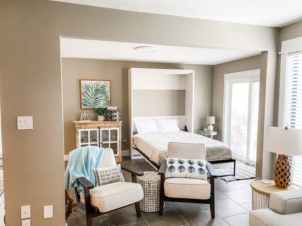 Sleeping space by night entertaining space anytime you need it with a murphy bed