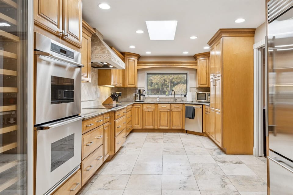 Fully stocked gourmet Kitchen with Subzero, toaster oven, drip & Keurig coffee