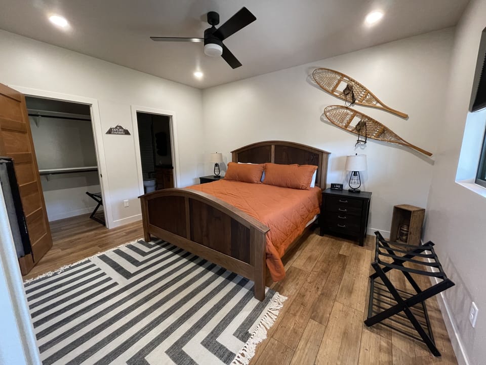 Main Level spacious master bedroom with king bed and en-suite