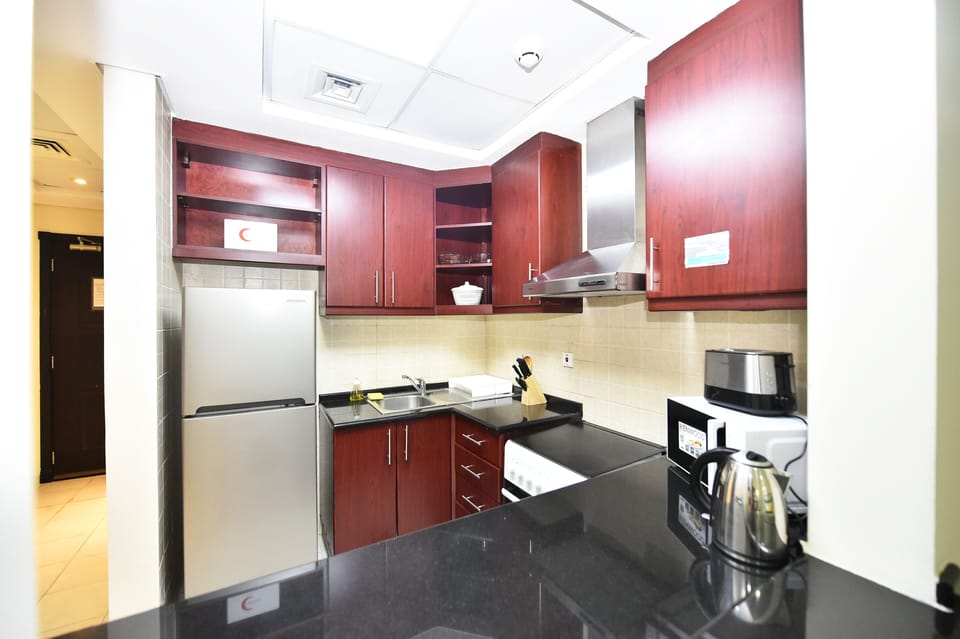 Studio | Private kitchen | Full-size fridge, microwave, stovetop, electric kettle