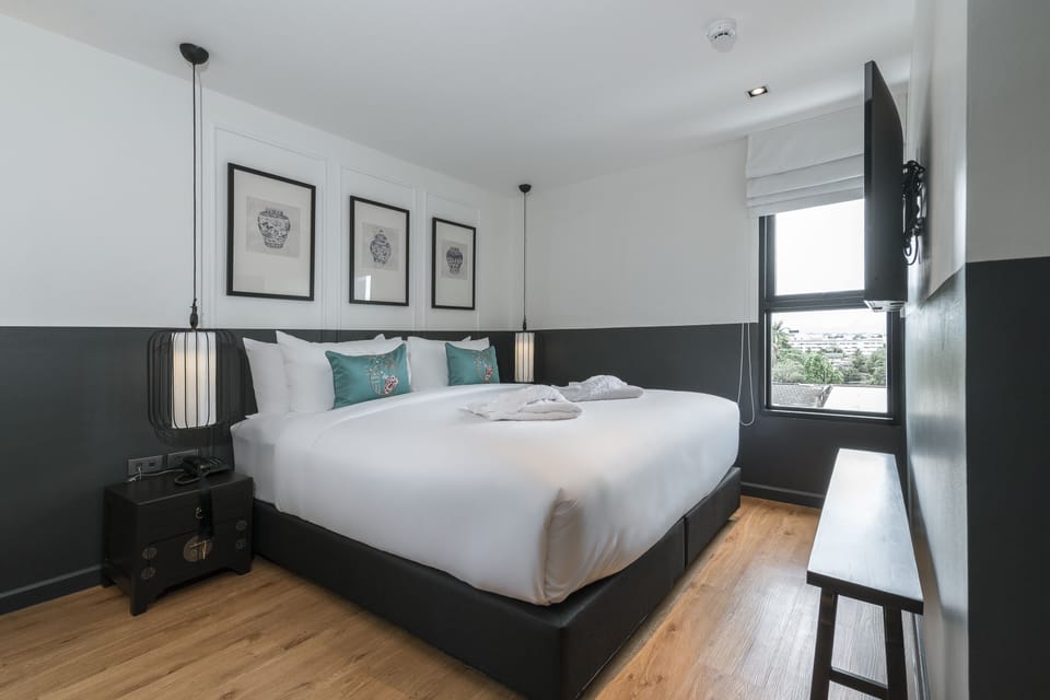 Deluxe Double Room | Minibar, in-room safe, desk, iron/ironing board (on request)