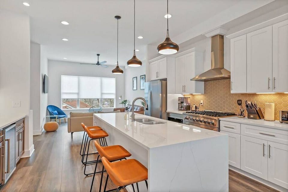 Gorgeous open floor plan, and large kitchen island in the center.