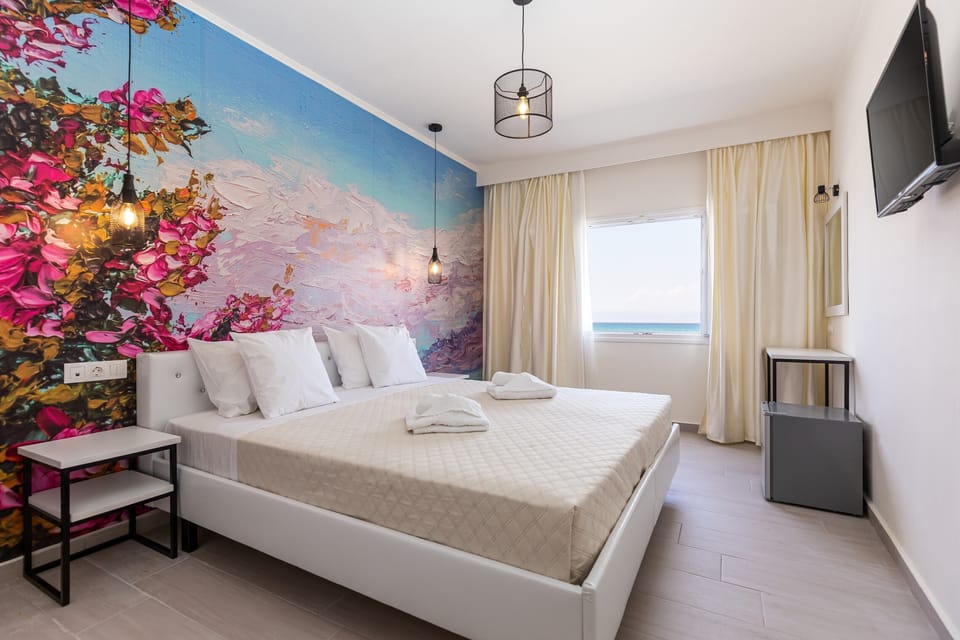 Double or Twin Room, Sea View | Blackout drapes, soundproofing, iron/ironing board, free WiFi