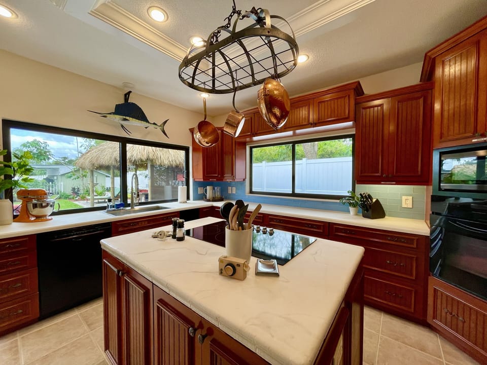 Large Chef’s Kitchen is a great gathering place while preparing a meal. 