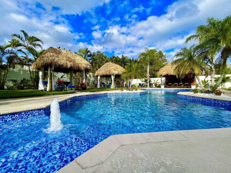 Bubbling fountain invites one to enjoy the heated salt water pool.