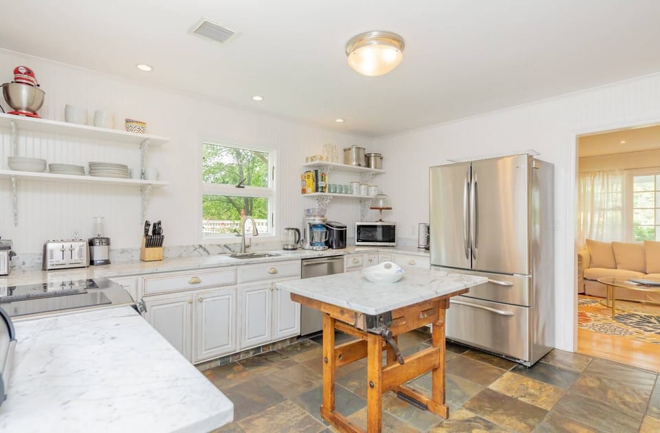 Fully Equipped Kitchen With Door To BBQ Area / Deck And Pool