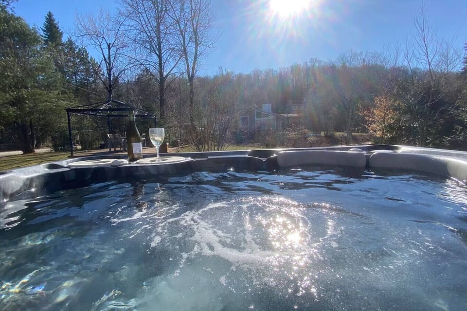 Relax and enjoy the sunshine in the outdoor jacuzzi.