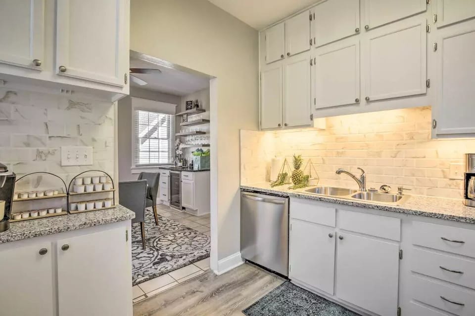 The kitchen is a custom design. The coffee bar is there for a quick wake-me-up.