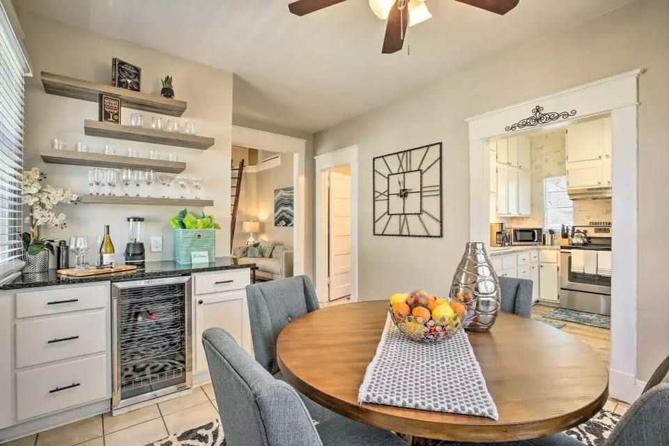 This dining room is drop-dead gorgeous. The custom-designed bar is one of a kind