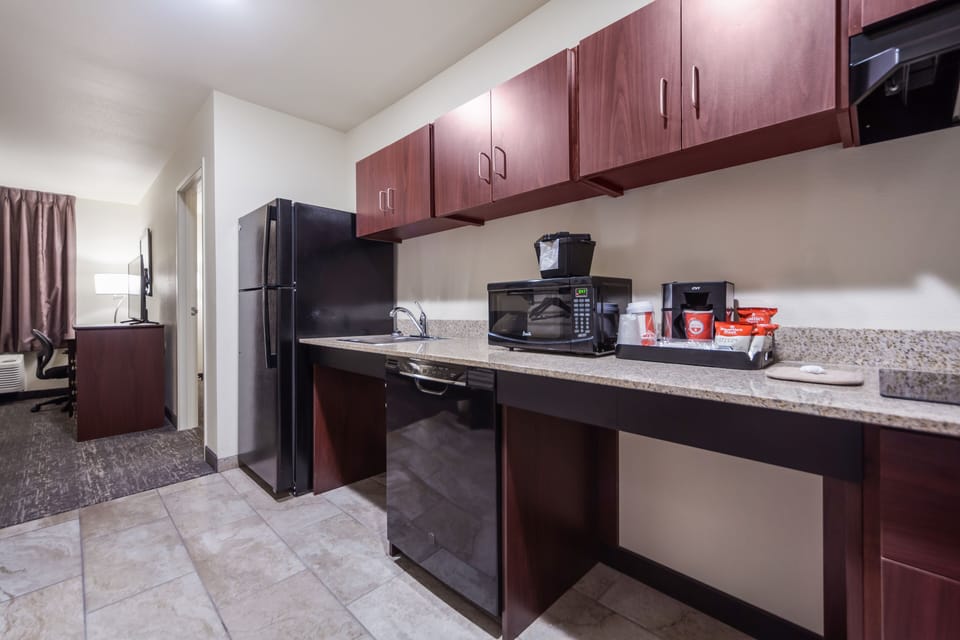 Suite, 1 King Bed with Sofa bed, Accessible, Non Smoking (Audible/Visual Alert) | Private kitchen | Fridge, microwave, coffee/tea maker