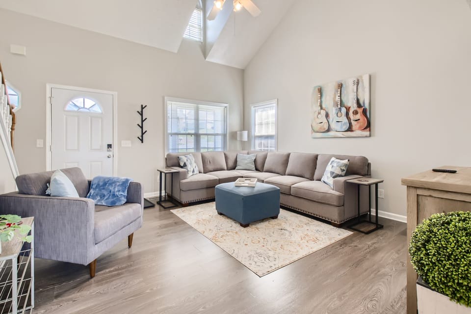 Spacious living room with plenty of seating for everyone. 