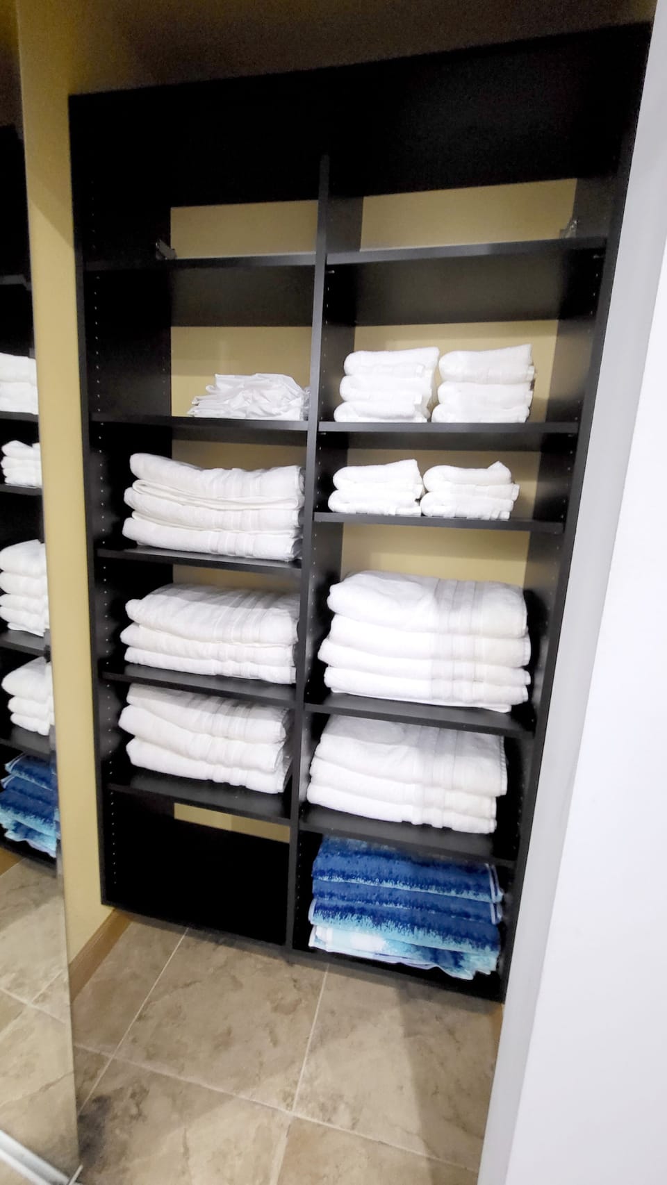 Towel closet in the master bathroom