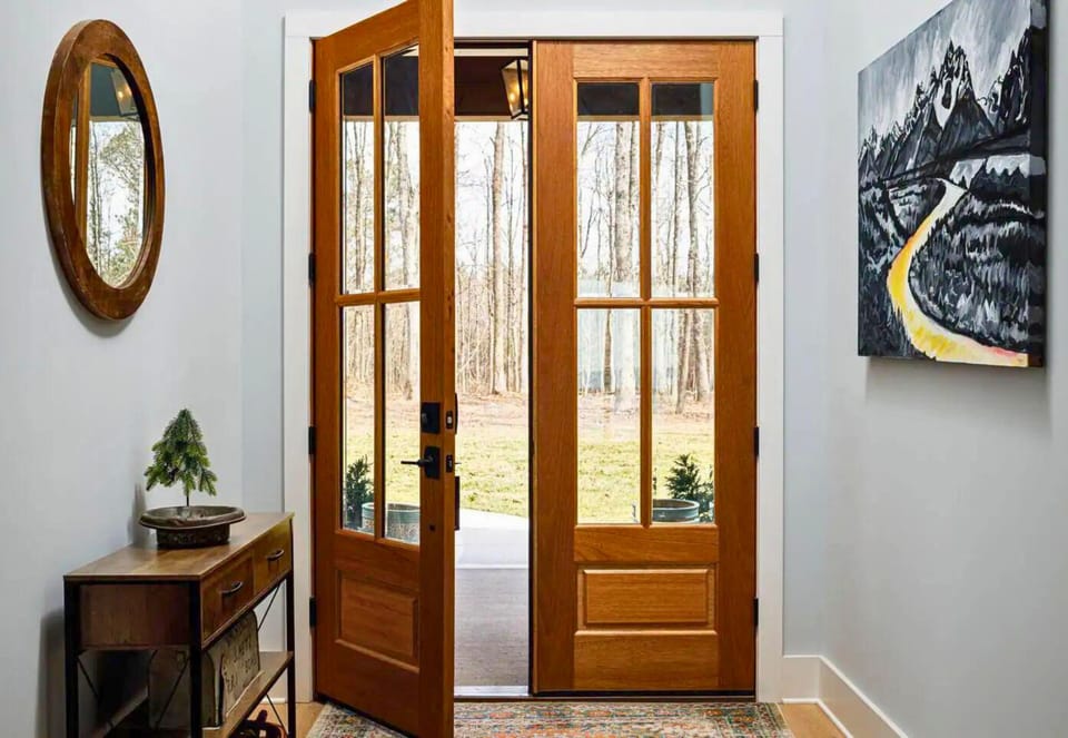 A warm and inviting entrance awaits you, blending rustic charm with modern style