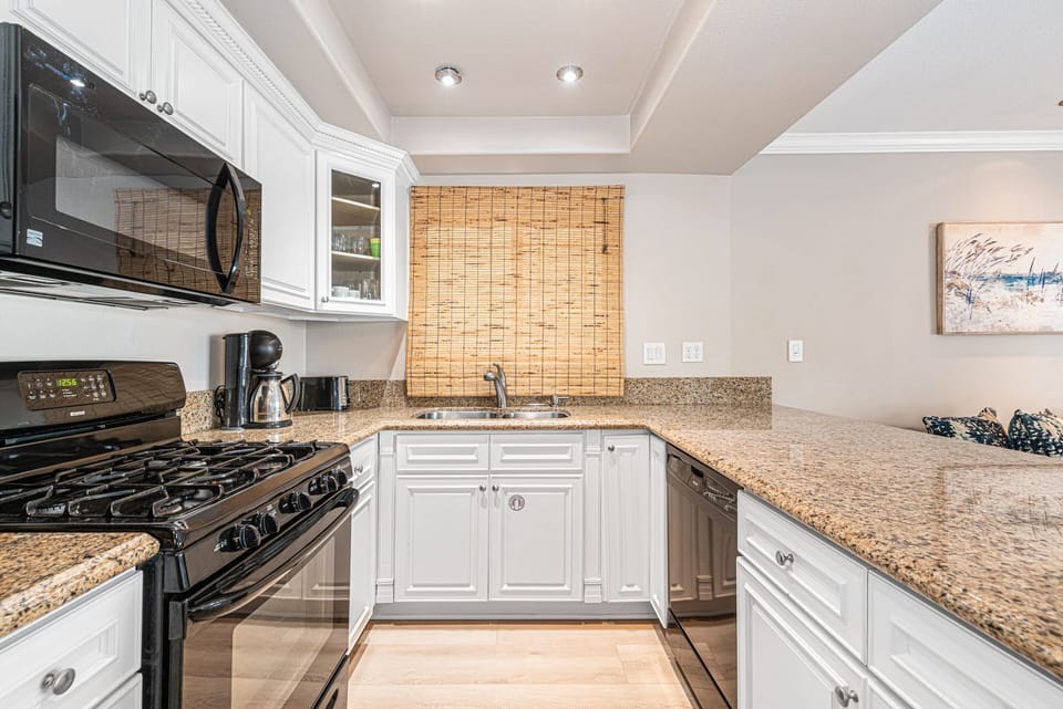 The kitchen comes stocked with dishes, utensils, cookware, bakeware, and large & small appliances. Guests must provide their own food, drink, condiments, and spices.
                