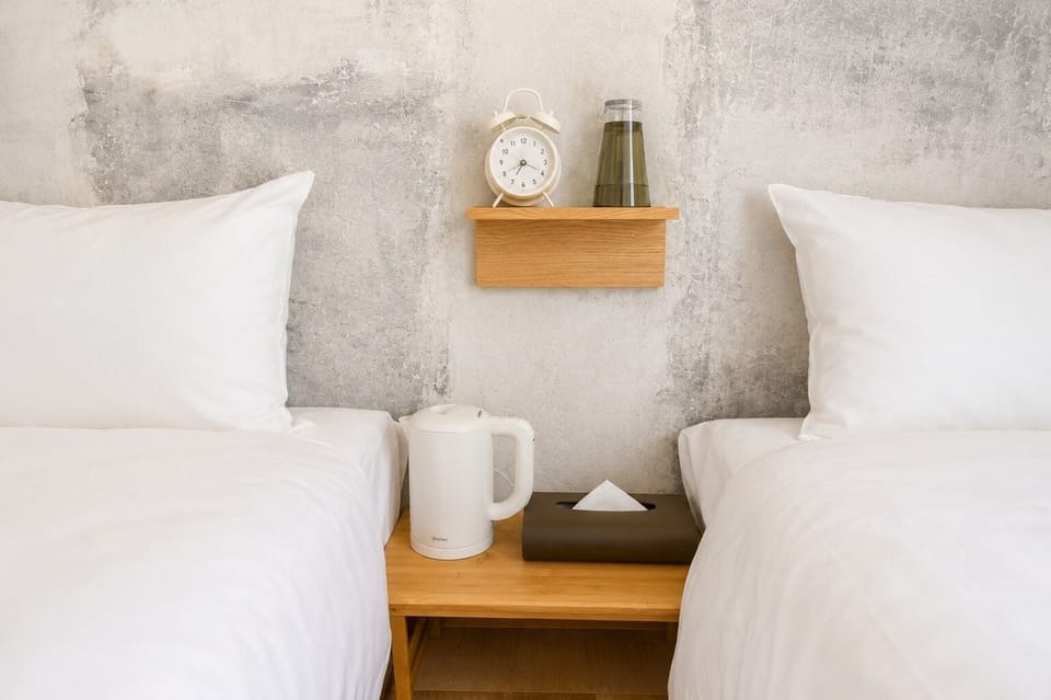 Standard Twin Room | Blackout drapes, iron/ironing board (on request), WiFi (free)
