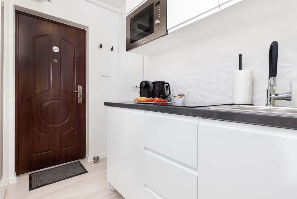 A functional kitchenette that provides a comfortable space for preparing your favourite meals.