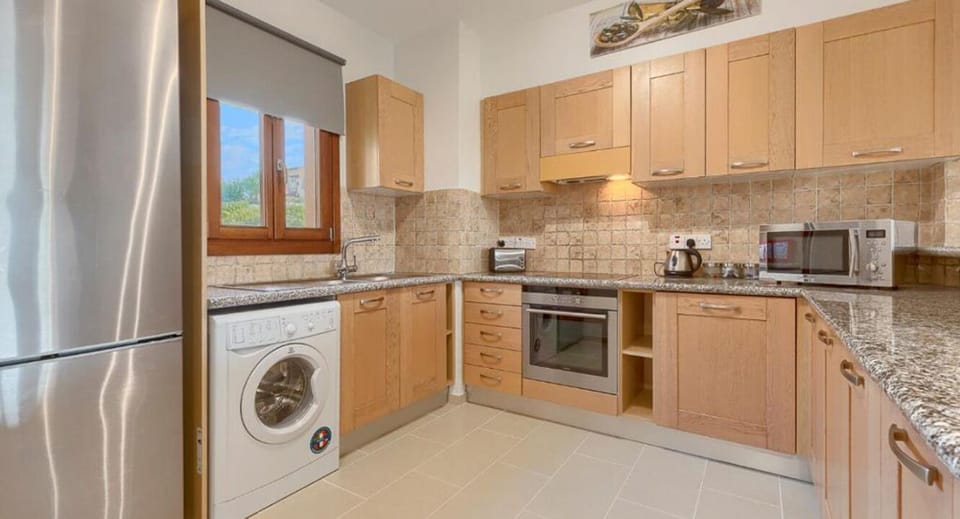 Luxury Apartment | Private kitchen | Espresso maker, coffee/tea maker, full-size fridge, microwave