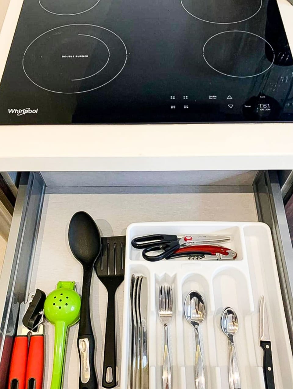 Organized shelf with utensils and chalkboard, making cooking a breeze in Playa del Carmen