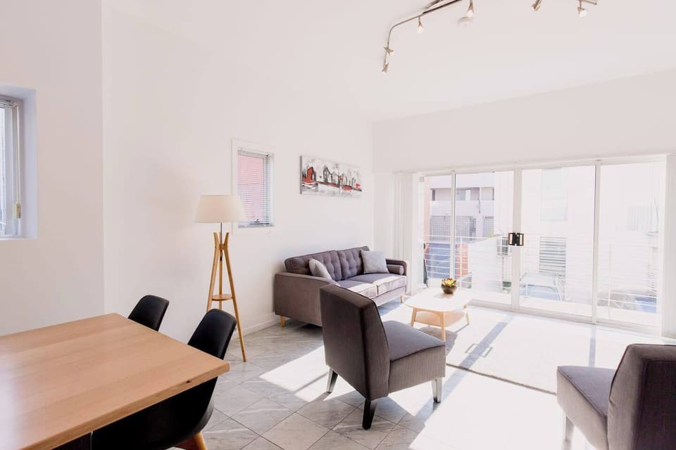 The dining area is the perfect spot for enjoying home-cooked meals or takeout from the nearby restaurants and cafes.