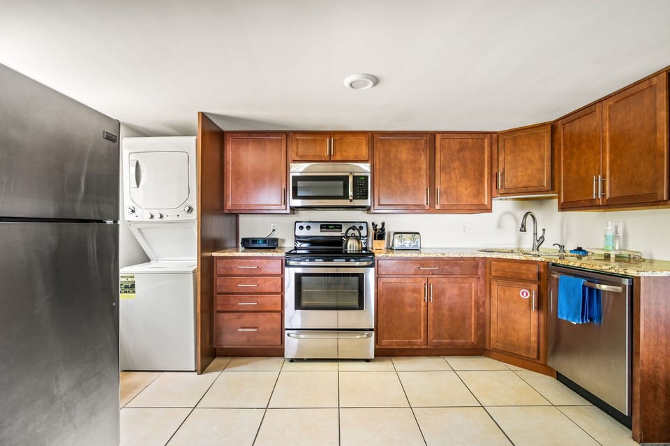The kitchen is fully-stocked with all cooking and dining necessities provided.