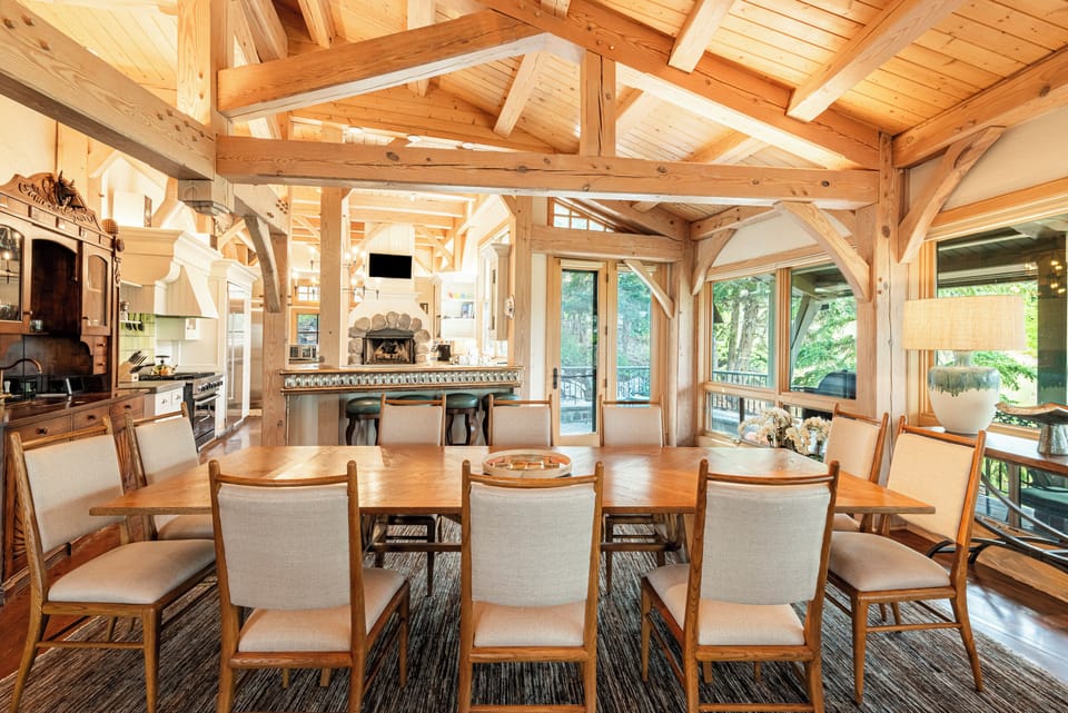 Dining Area with seating for 8, deck access, and ski slope views