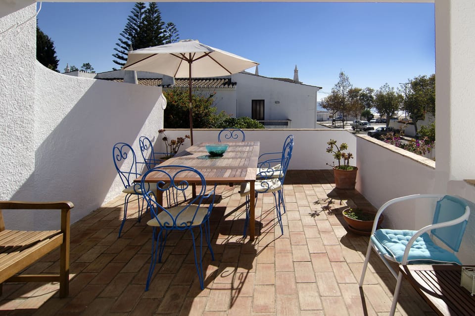 Upper terrace with sea view and dining table